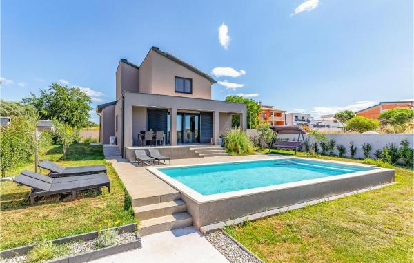 A la foto es mostra l'objecte Cozy Home In Pula With Wifi situat a la ciutat de Pula.