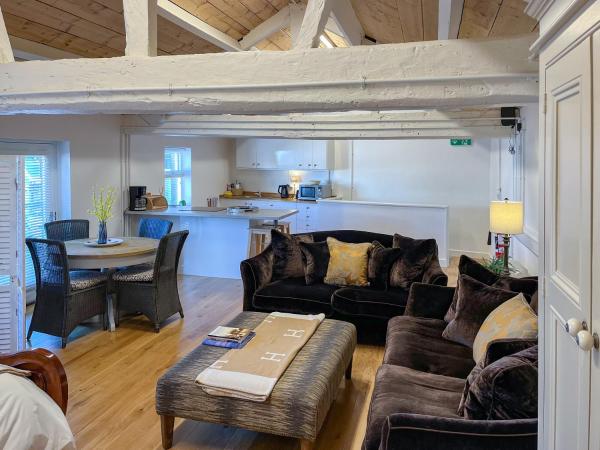 A la foto es mostra l'objecte The Ilkley Loft Suite situat a la ciutat de Denton.