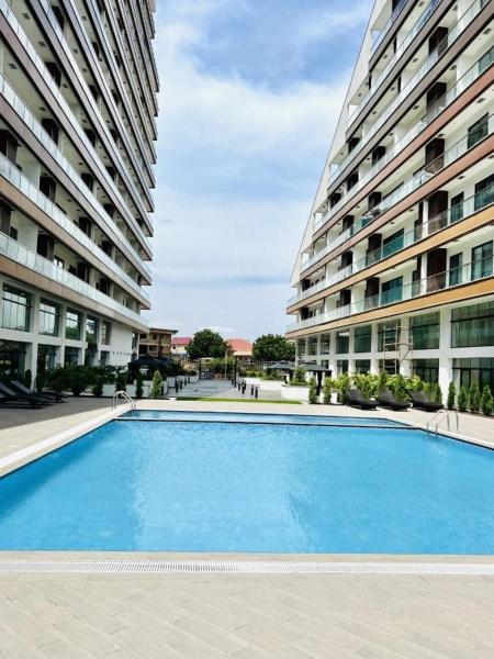 A la foto es mostra l'objecte Cozy & Luxurious East Legon Apt with gym, pool & rooftop situat a la ciutat de Accra.