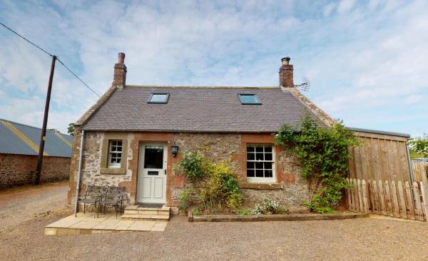 A la foto es mostra l'objecte Mrs Moll's Cottage situat a la ciutat de Blainslie.