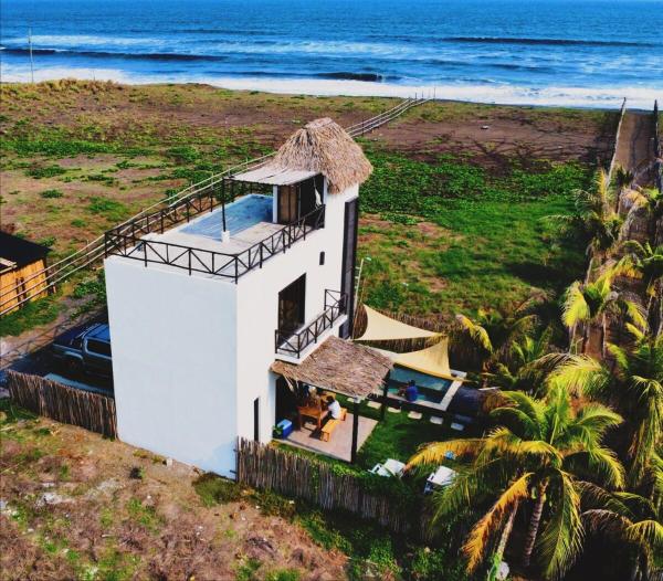 En la foto se muestra el objeto Casa Praia Paredon ubicado en la ciudad de El Naranjo.
