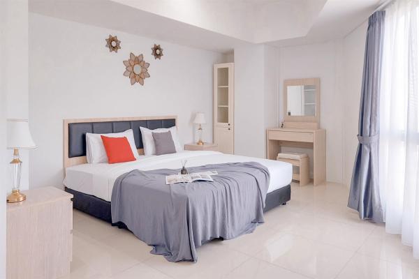 Na fotografii je vidět objekt Comfortable and Homey 1BR Tamansari Bintaro Mansion Apartment By Travelio nacházející se ve městě Pondokaren.