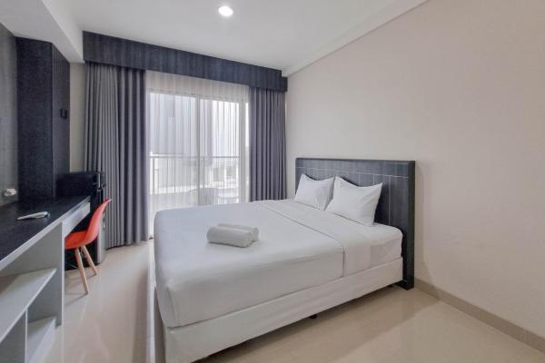 A la foto es mostra l'objecte Homey and Scenic Studio at Patraland Amarta Apartment By Travelio situat a la ciutat de Kejayan.