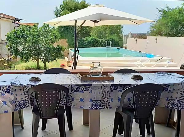 En la foto se muestra el objeto House turkish scale- benvenuti al sud ubicado en la ciudad de Realmonte.