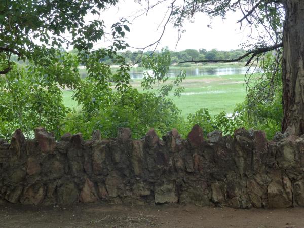The photo shows the Nyime Safari Lodge Campsite located in the city of Divundu.