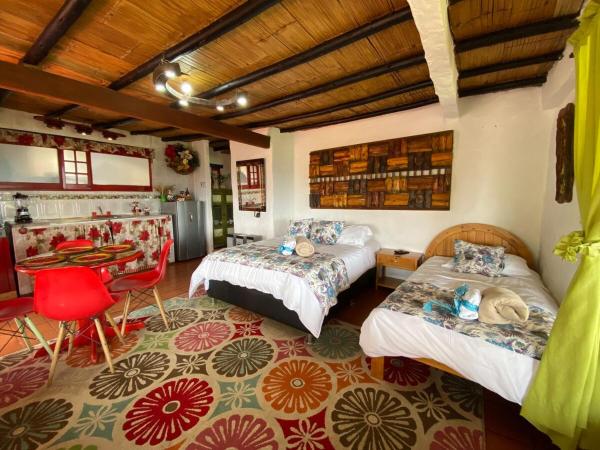 A la foto es mostra l'objecte Cabaña El Botón Seilan Alojamiento Rural situat a la ciutat de Paipa.