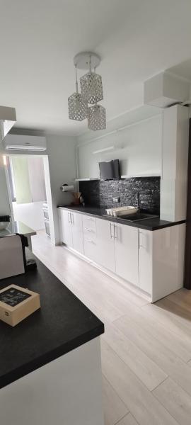 A la foto es mostra l'objecte Apartament modern situat a la ciutat de Râmnicu Vâlcea.