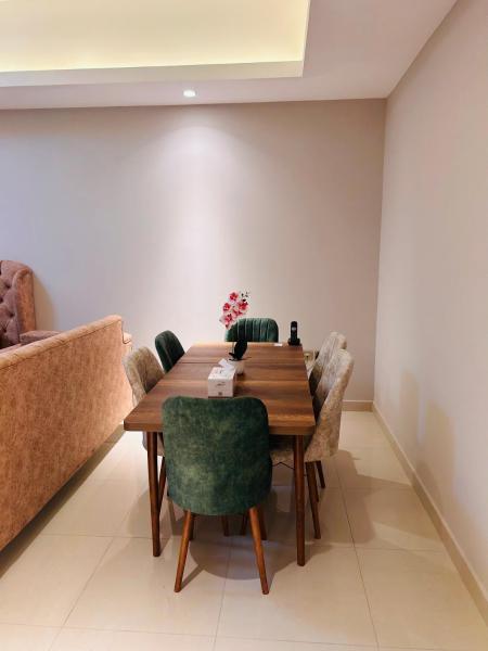 Na fotografii je vidět objekt MaGdolina Gust apartment nacházející se ve městě Adžmán.