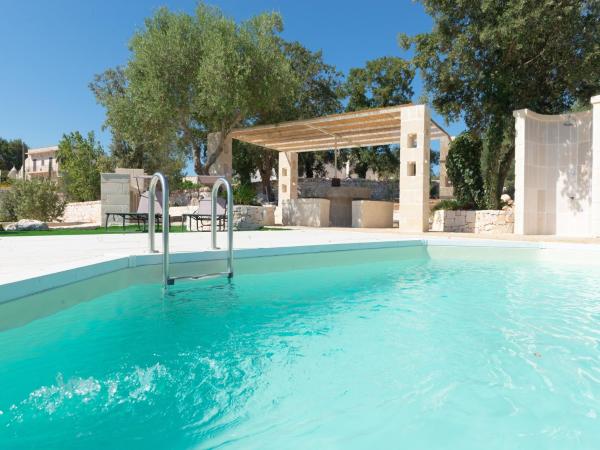 Nella foto è visibile l'oggetto Trulli in Puglia with Pool and Scenic Views situato nella città di Cocolicchio.