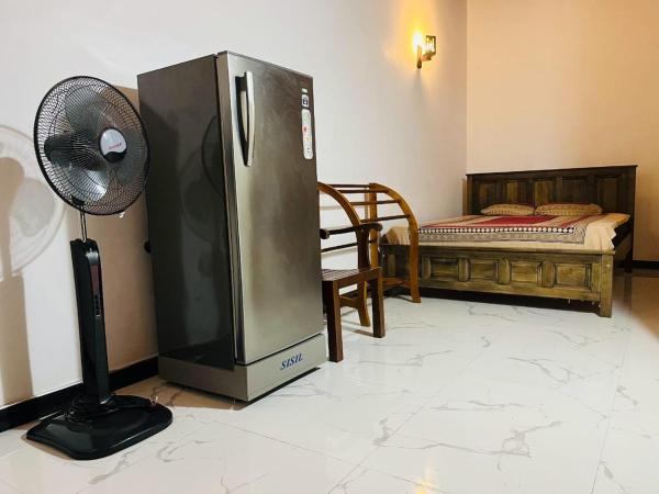 Na foto é possível ver o objeto Rent Home localizado na cidade de Udukawa.