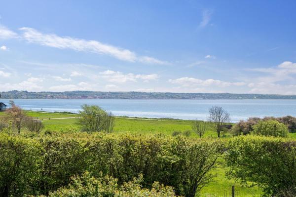 A la foto es mostra l'objecte Lovely Holiday Home With Panoramic Views Over Ebeltoft Vig And Mols situat a la ciutat de Ebeltoft.