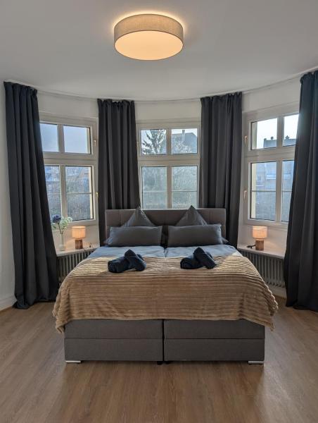 Na zdjęciu widoczny jest obiekt Villa Baumhaus Apartments położony w mieście Hamm.
