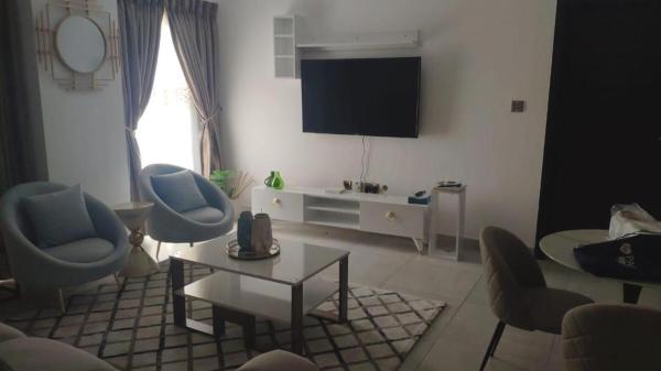 照片显示了位于Okponglo市的Luxurious space for you the signature apartment物件。