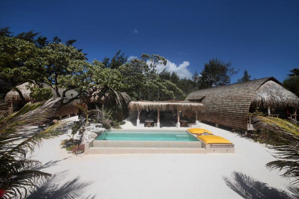 Kuvassa näkyy kohde Tiki Beach Moorea , Piscine & Petit Déjeuner, joka sijaitsee kaupungissa Temae.