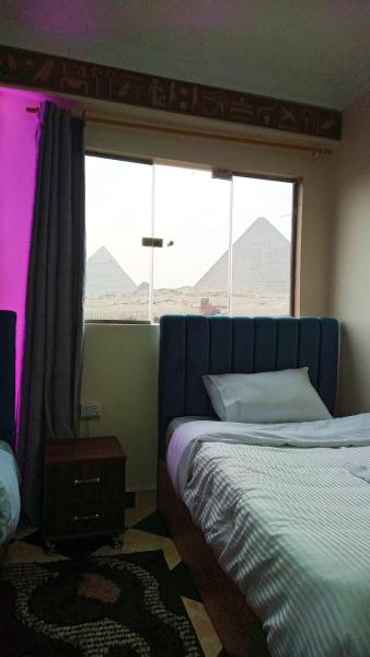 Nella foto è visibile l'oggetto pyramids show view Room situato nella città di Il Cairo.