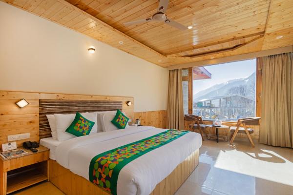 На фото показан объект Treebo Premium Silverstone Resort With Mountain Valley View, расположенный в городе Манали.