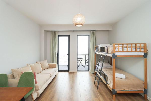 På billedet ses objektet Cozy & Family-friendly Apartment in Gudauri - by Wehost beliggende i byen Gudauri.
