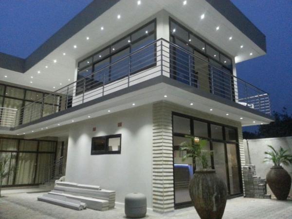 The photo shows the Pamo Hotel and Restaurants located in the city of Kitwe.