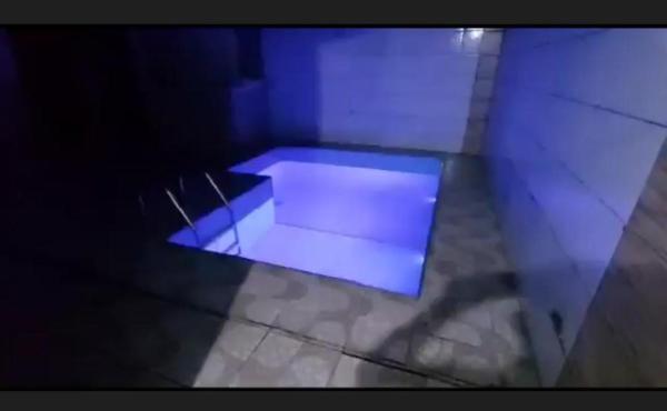 Na fotografii je vidět objekt Casa confortável com área de lazer nacházející se ve městě Belém.