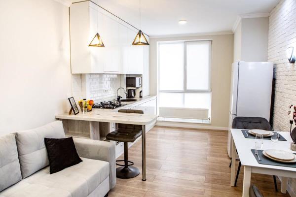 The photo shows the Quiet & Stylish, near Center penthouse - Free coffee, Netflix & much more - GrandStay md located in the city of Codru.