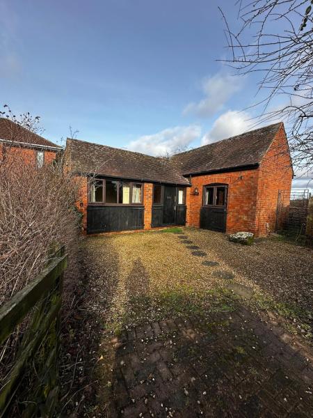 A la foto es mostra l'objecte Detached Cottage, Driveway, WiFi, Smart TV situat a la ciutat de Bubbenhall.