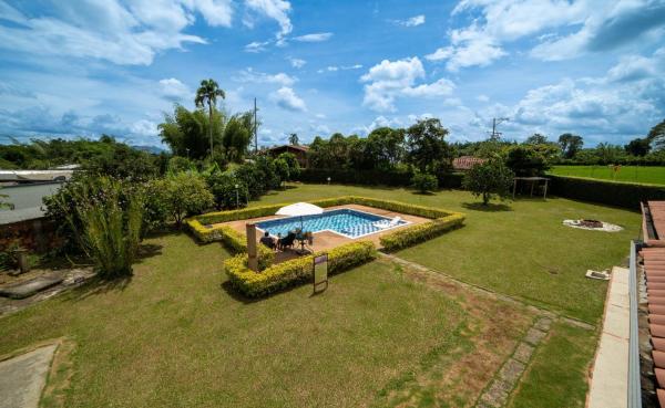 På billedet ses objektet Finca descanso a 5 mts del parque del Café, Wifi, Piscina, Tv, Bbq 23Px beliggende i byen Riveralta.