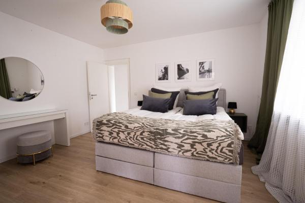 A la foto es mostra l'objecte Ferienwohnung mit Garten-Terrasse-Grill-WiFi-Parkplatz-Baby-Kinder Bostalsee situat a la ciutat de Konken.