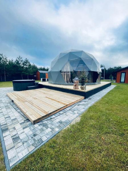 Op de foto is het object Glamping Modern te zien, gelegen in de stad Różan.