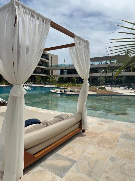 Na fotografii je vidět objekt Flat Aconchegante em Muro Alto - Porto de Galinhas nacházející se ve městě Ipojuca.