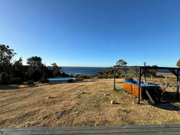 Nella foto è visibile l'oggetto Casa frente al mar, Chaihuin situato nella città di Corral.
