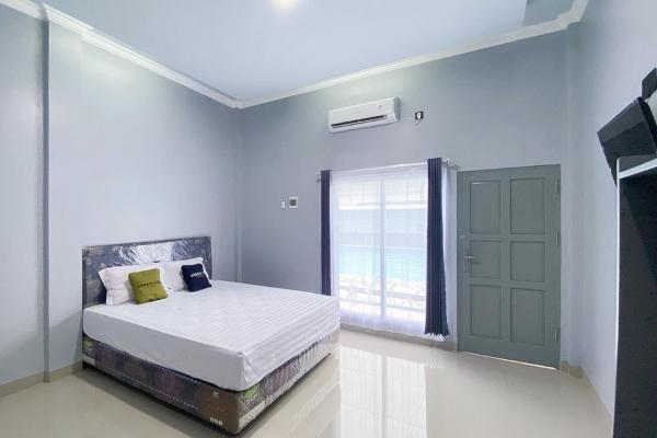 The photo shows the Urbanview Hotel Menteng Jaya GH Palangka Raya located in the city of Tumbangrungan.