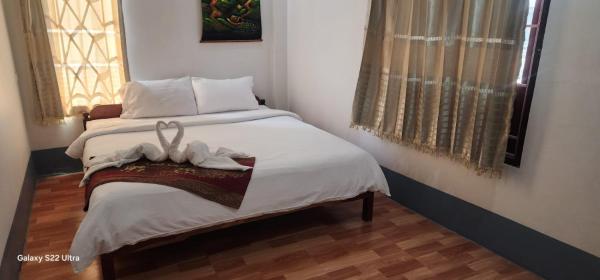 Na foto é possível ver o objeto Thip Phavanh Guesthouse localizado na cidade de Pakbeng.