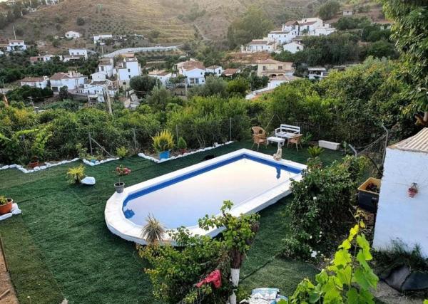 På billedet ses objektet Hermosa Casa con Piscina y Gran Vista a la Montaña beliggende i byen Viñuela.