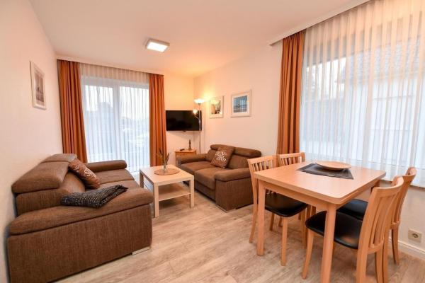 På bilden syns objektet Ferienwohnung NW 27 mit Balkon som ligger i staden Duhnen.