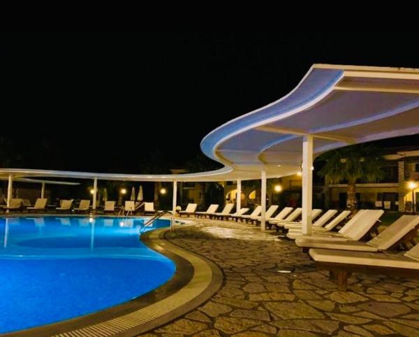 A la foto es mostra l'objecte Perdika Resort situat a la ciutat de Perdika.