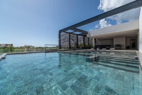 Na zdjęciu widoczny jest obiekt Lux 2BR with Rooftop Pool and Close to Beach położony w mieście Tulum.