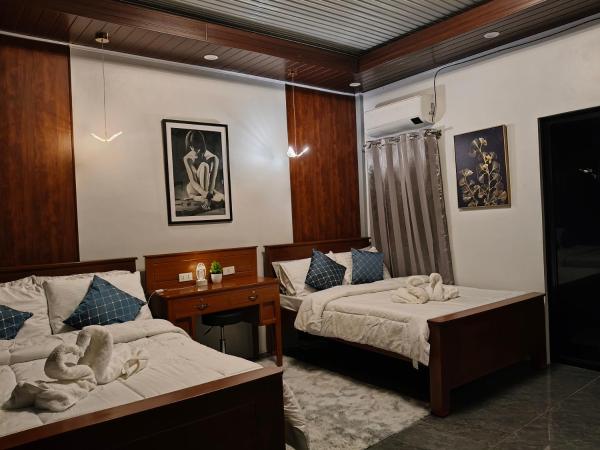 På billedet ses objektet Goldland Caelestis Guest House beliggende i byen Bacolod.