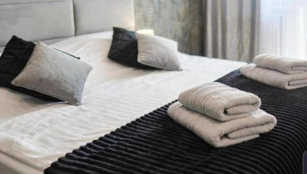 Na zdjęciu widoczny jest obiekt Kopernik Premium Rooms Apartment położony w mieście Toruń.