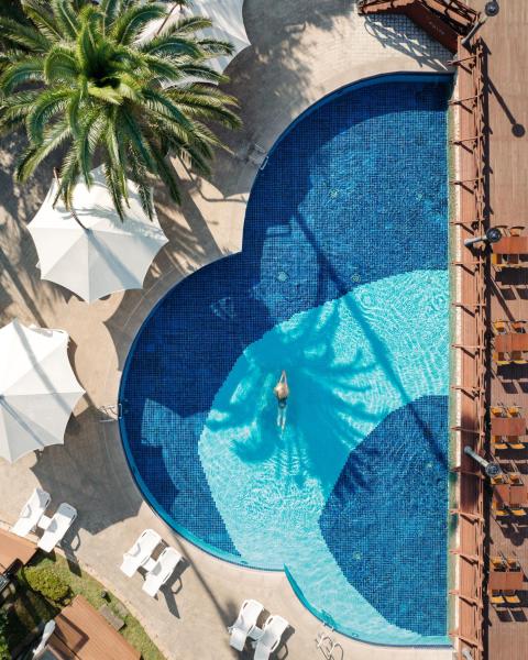 A la foto es mostra l'objecte The Suites Hotel Jeju situat a la ciutat de Sangye-ri.