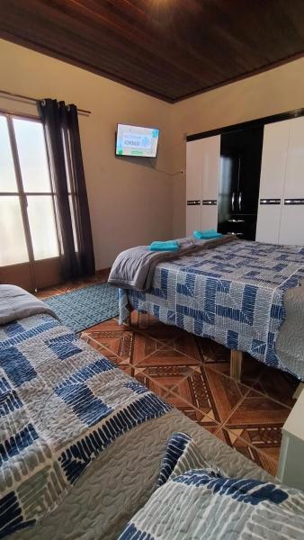 Na fotografii je vidět objekt São Lourenço MG Casa Completa ou Quarto Hostels das Águas Home nacházející se ve městě São Lourenço.