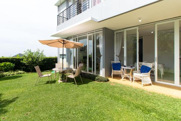 Na fotografii je vidět objekt Family Only Compact Villa with City View - De Reiz Rose Garden Syariah 2BR nacházející se ve městě Ciburial.