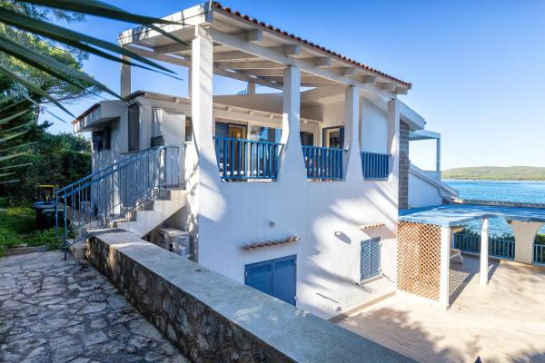 Στη φωτογραφία φαίνεται το αντικείμενο SARDINIA RE - Porto Conte Bay Terrace που βρίσκεται στην πόλη Isola Foradada.