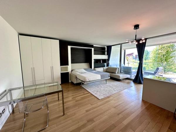 A la foto es mostra l'objecte Loft with winter garden situat a la ciutat de Assago.