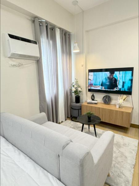 A la foto es mostra l'objecte The Niall's Suites at HOPE Residences besides SM TRECE situat a la ciutat de Bitangan.