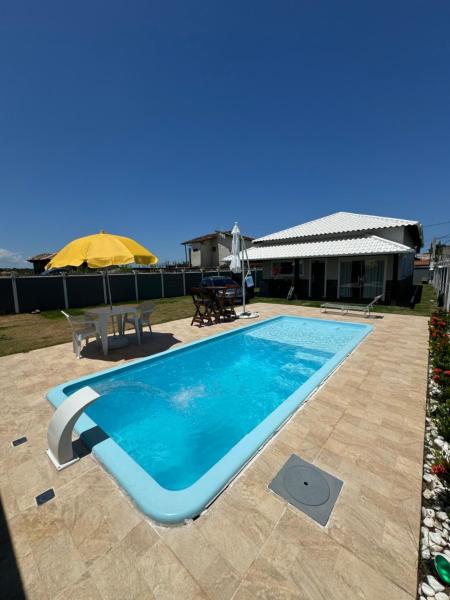 Auf dem Foto ist das Objekt Casa com Piscina,Area gourmet,3 quartos,espaço Kids in der Stadt Ipitangas zu sehen.