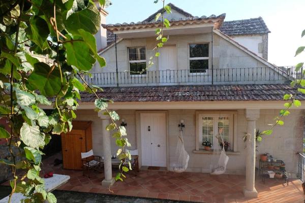 照片显示了位于Crecíente市的Casa Vallejo en Crecente物件。