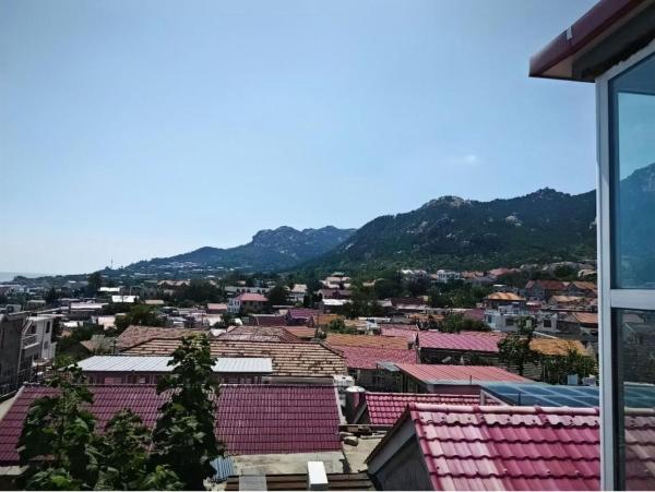 Фотография 2: 中国山东青岛崂山雕龙嘴农家院