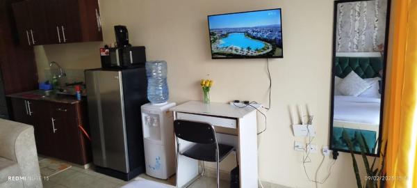 A la foto es mostra l'objecte Sunny studio chic comfort near UN situat a la ciutat de Muchatha.
