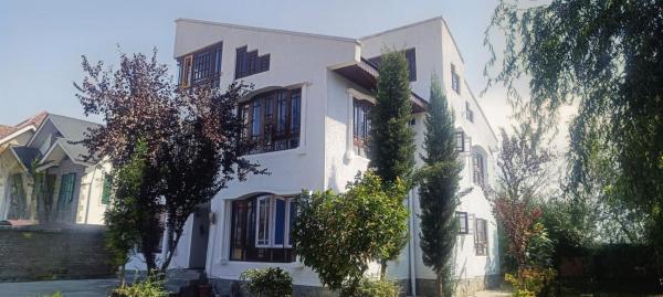 A la foto es mostra l'objecte Magnolia Homestay situat a la ciutat de Srinagar.