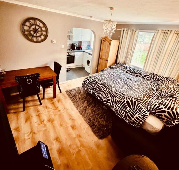 A la foto es mostra l'objecte Cosy flat 10 mins from station situat a la ciutat de Elmers End.